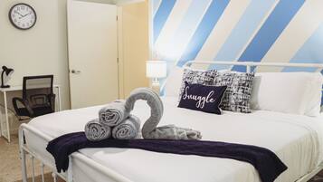 1 bedroom, desk, iron/ironing board, travel crib