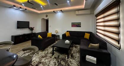 (5) 3-bedroom quiet apartment with free parking, balcony & sitting areas.
