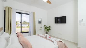 1 bedroom, desk, iron/ironing board, travel crib