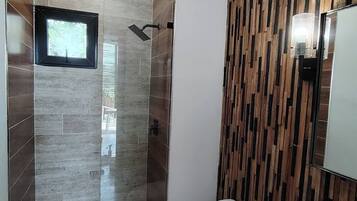 Shower, towels, toilet paper