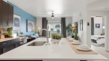 1 bedroom, desk, iron/ironing board, travel cot