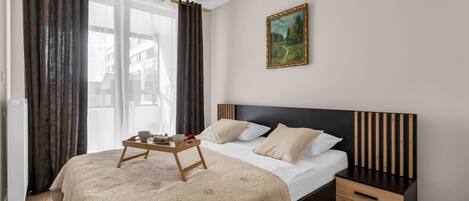 2 slaapkamers, een strijkplank/strijkijzer, gratis wifi, beddengoed