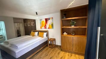 Deluxe Double Room | Living area | TV