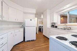 Condo, Multiple Beds, Kitchen, Garden View (1020 Garfield St. (Suite 1,2,3)) | Private kitchen | Fridge, microwave, oven, stovetop - Ultimate Group Getaway Big Yard, Fire Pit, Grill (Fort Collins)
