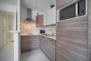 Fridge, microwave, coffee/tea maker, electric kettle