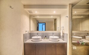 Shower, towels, soap, toilet paper