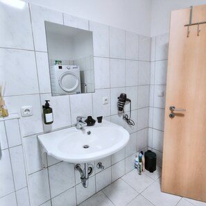 Hair dryer, towels, soap, toilet paper