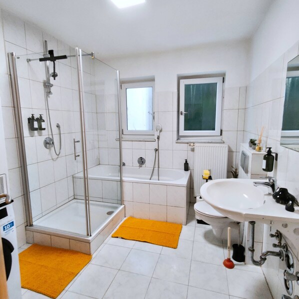 Hair dryer, towels, soap, toilet paper