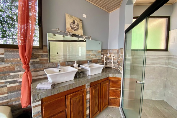 Shower, jetted tub, towels, soap