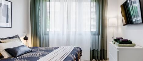 2 dormitorios, tabla de planchar con plancha, wifi y ropa de cama