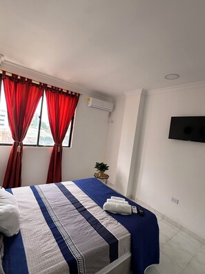 2 habitaciones, tabla de planchar con plancha, wifi y ropa de cama 