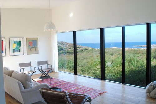 Architect house with sea view in the middle of nature