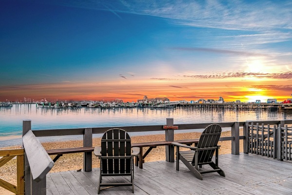 Relax and recharge on the shared outdoor deck — perfect for morning coffee.