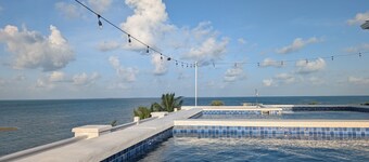 Modern and brand new 3-bedroom condo with private rooftop pool with majestic views.