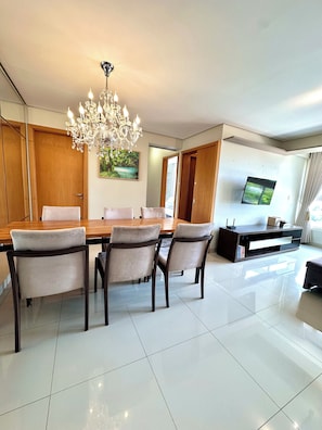 Deluxe Apartment, City View | Living area | 42-inch Smart TV with digital channels, Netflix, streaming services