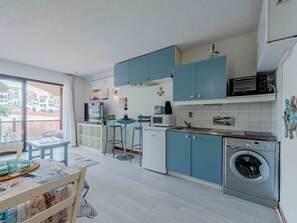 Fridge, microwave, cookware/dishes/utensils