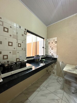 Economy Townhome, Patio | Private kitchen