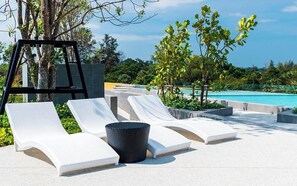 Outdoor pool, pool umbrellas, pool loungers