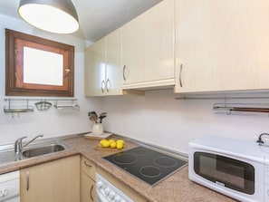Fridge, microwave, oven, cookware/dishes/utensils