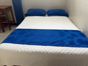 Desk, laptop workspace, free WiFi, bed sheets
