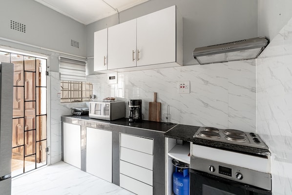 Fridge, microwave, oven, stovetop