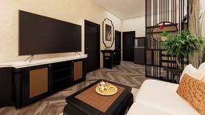 Family Suite | Living area | TV