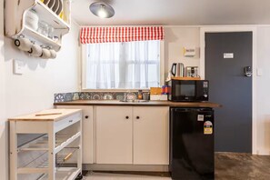 Fridge, microwave, electric kettle, toaster