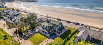 Newly renovated oceanfront home on Gooch's Beach with breathtaking views and direct beach access. This 7-bedroom retreat offers modern comforts, spacious gathering areas, and is just a short walk to Dock Square's shops, restaurants, and attractions.