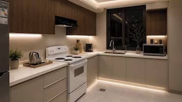 Comfort Apartment | Private kitchen | Fridge, microwave, coffee/tea maker, electric kettle