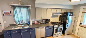 Downtown Hideaway in Cute Village Home. Off Street Parking + Washer & Dryer.