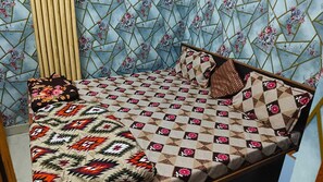 Standard Room, Balcony | Free WiFi, bed sheets - Dev In Guest House (Varanasi)
