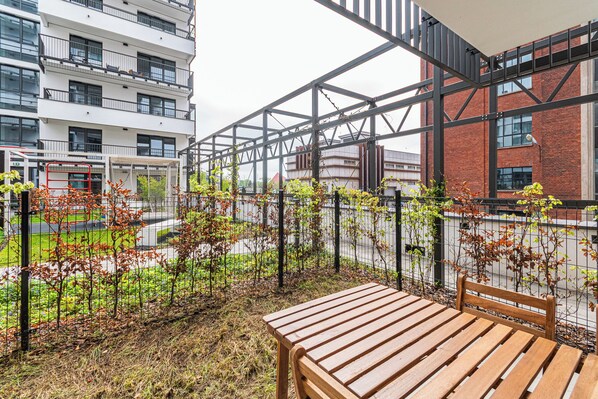 Apartamento Confort, patio, vistas al jardín | Terraza o patio