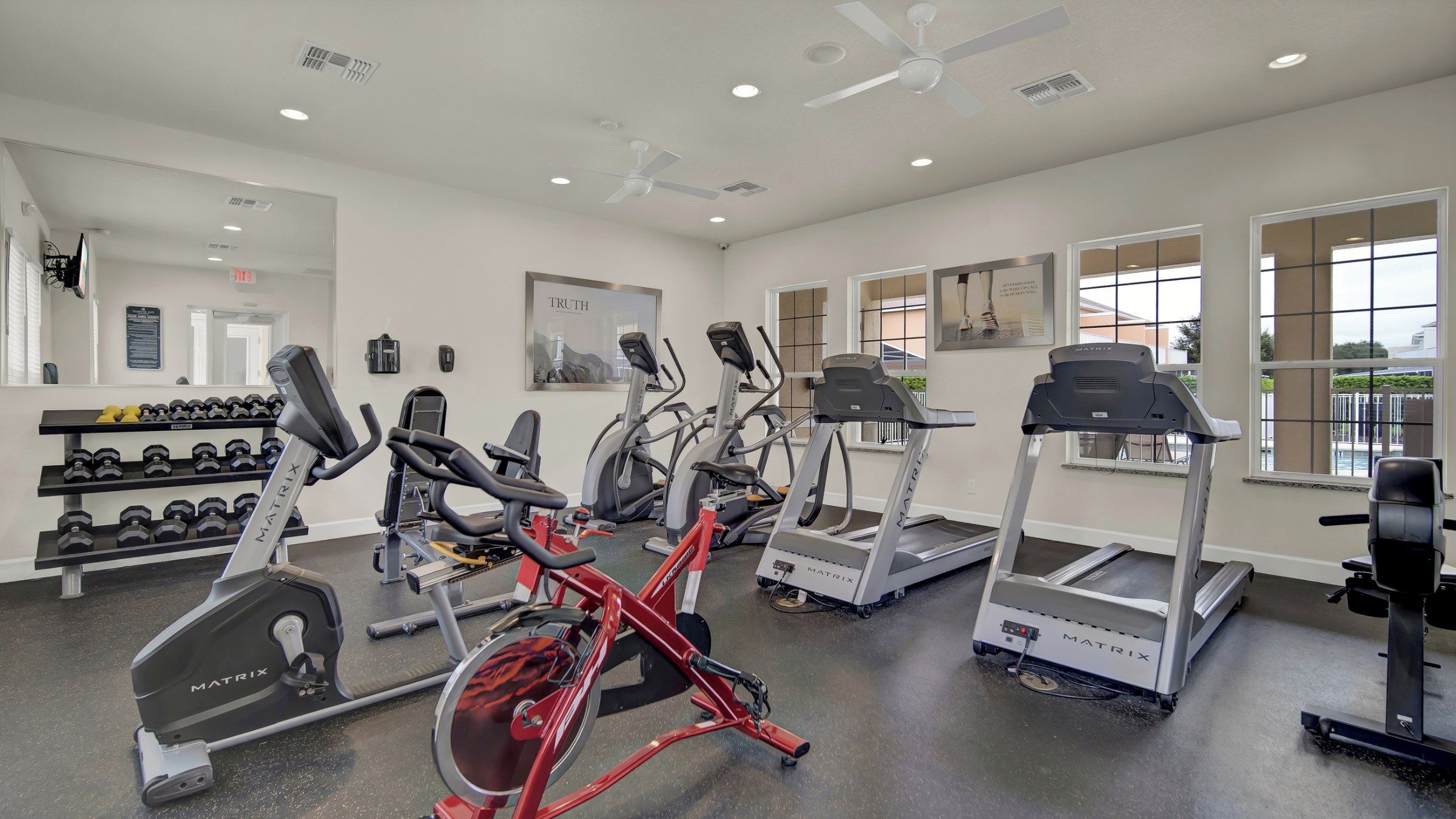 Resort fitness center with cardio machines and weights