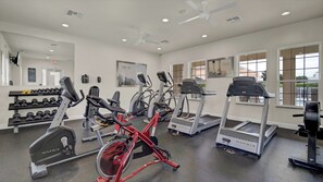 Resort fitness center with cardio machines and weights