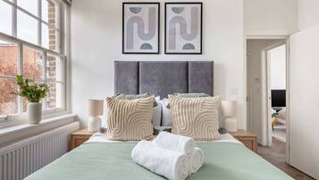 1 bedroom, desk, iron/ironing board, travel crib