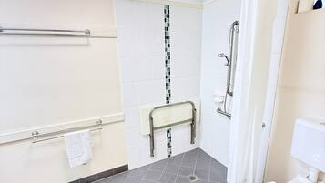 Shower, towels, soap, toilet paper