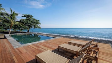 Outdoor pool, pool umbrellas, pool loungers
