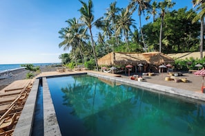 Outdoor pool, pool umbrellas, sun loungers