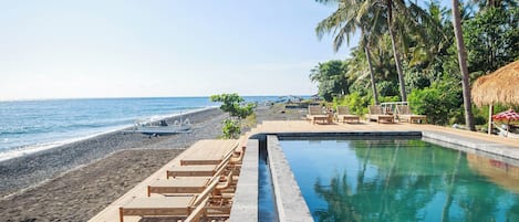 Outdoor pool, pool umbrellas, sun loungers