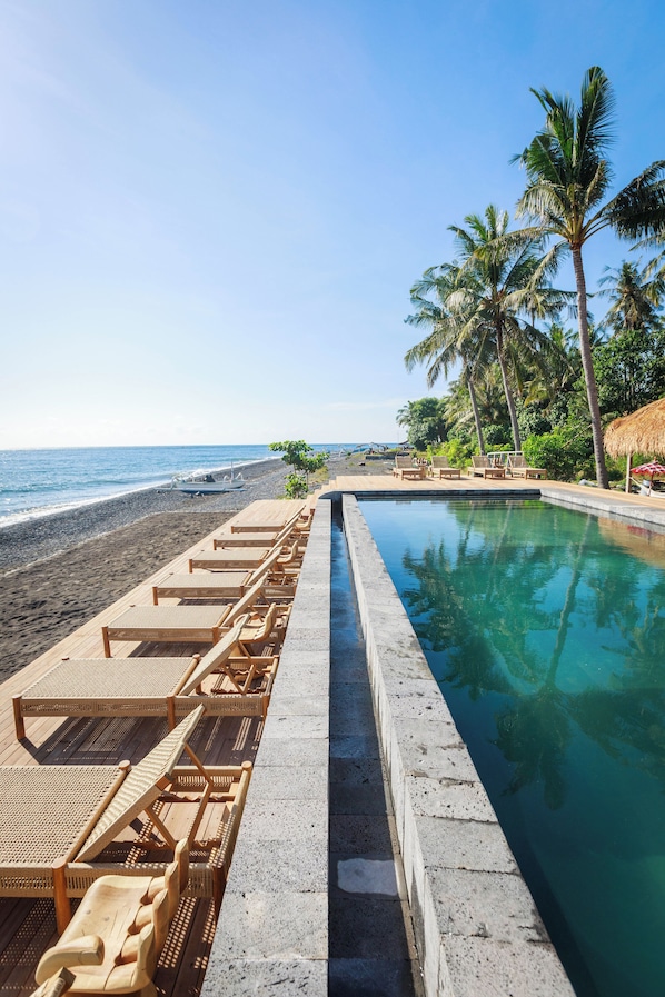 Outdoor pool, pool umbrellas, sun loungers