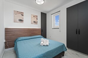 2 bedrooms, in-room safe, iron/ironing board, travel crib