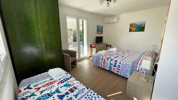 Appartement Deluxe, coin cuisine, vue mer | 2 chambres, décoration personnalisée, ameublement personnalisé