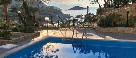 Seasonal outdoor pool, pool umbrellas, sun loungers
