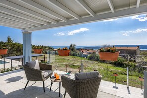 Outdoor dining - Modern Villa Novek with Pool and Sea View (Diminići)