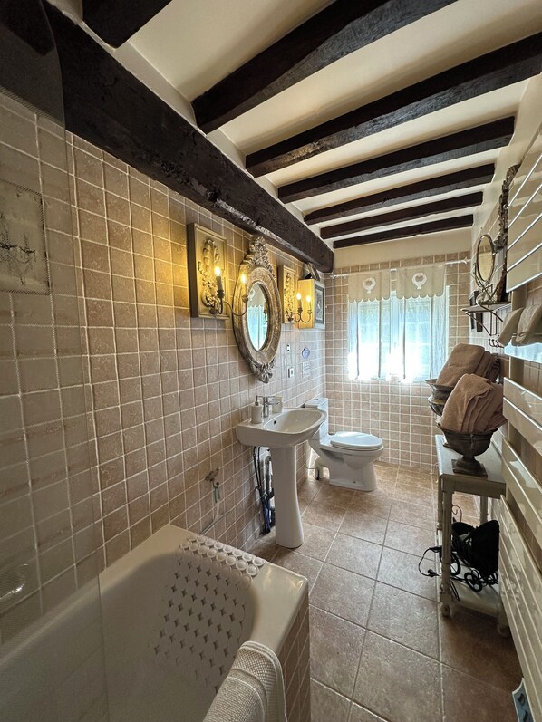 Hair dryer, towels, soap, toilet paper