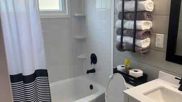 Hair dryer, towels, soap, toilet paper