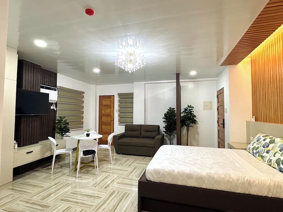 Family Studio Suite, Balcony, City View | Desk, laptop workspace, iron/ironing board, free WiFi