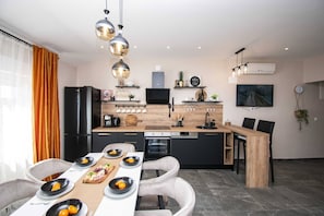 Appartement | Cuisine privée | Chaise haute