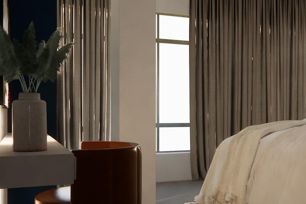 Suite estudio superior, vista a la ciudad | Wifi gratis