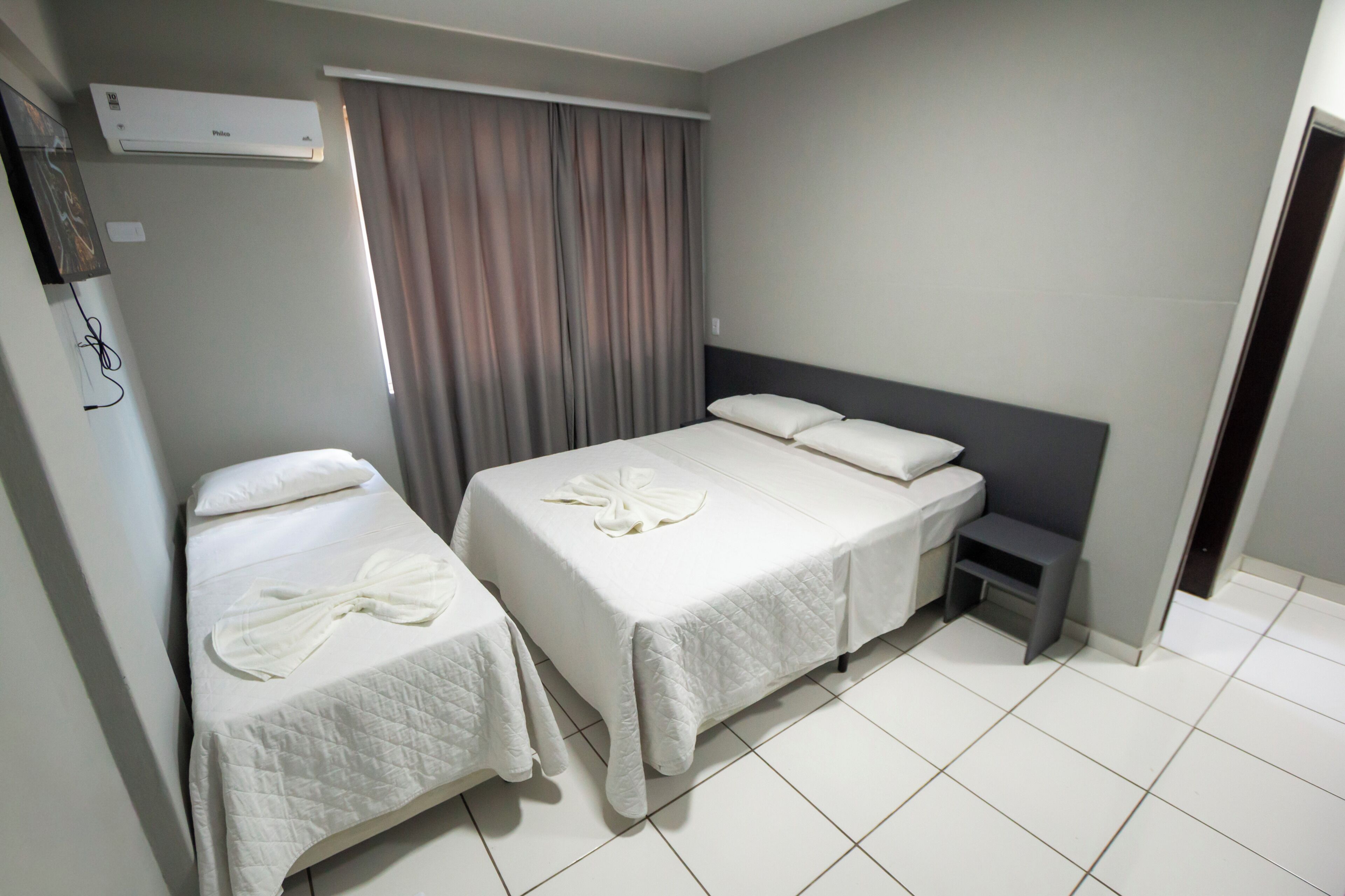 Habitación triple ejecutiva | Wifi gratis y ropa de cama